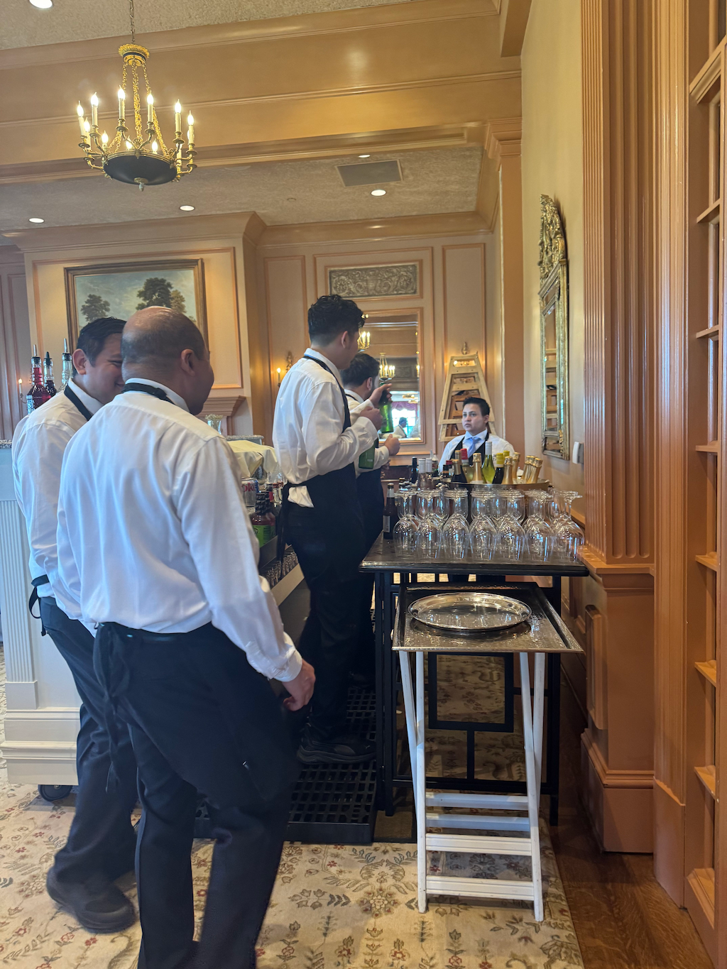 Instructor-led hospitality training session with professional service staff